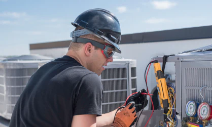 worker doing an hvac maintenance